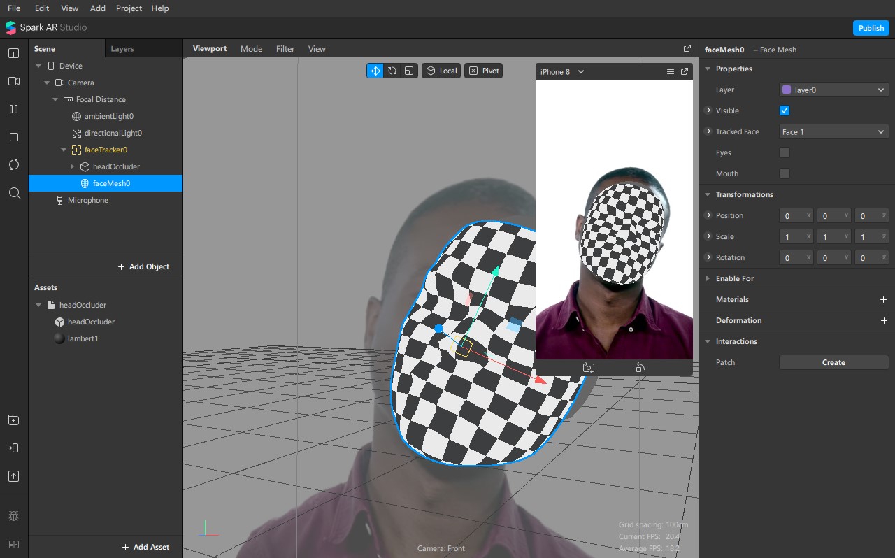 Adding the face mesh and head occluder mesh to our scene